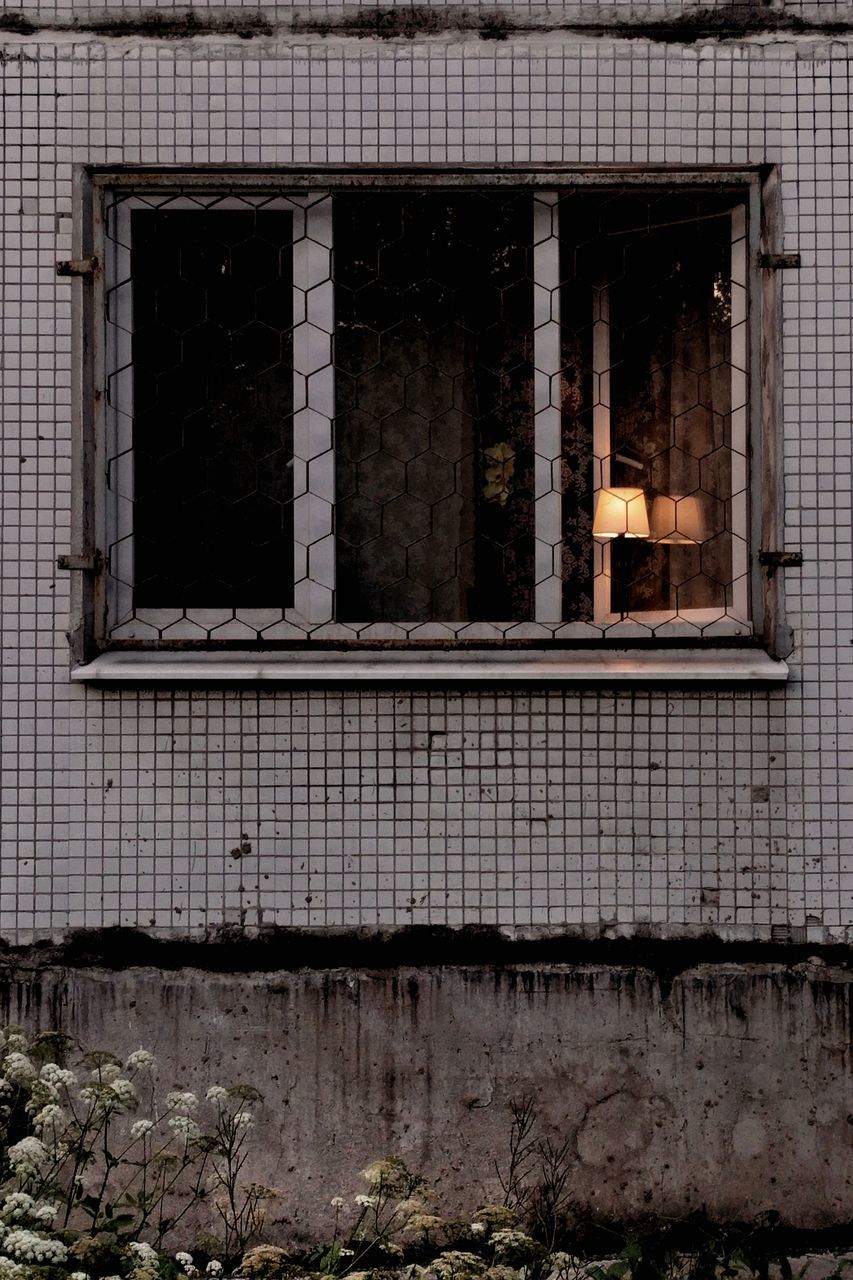 WINDOW OF ABANDONED HOUSE