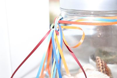 Close-up of multi colored candies in jar