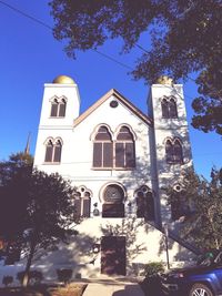 Low angle view of church against clear blue sky