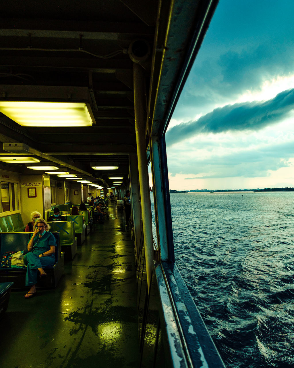 transportation, water, reflection, sky, mode of transportation, light, architecture, sunlight, sea, nature, cloud, vehicle, travel, built structure, evening, outdoors, nautical vessel, travel destinations, day