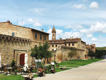 View of buildings against cloudy sky