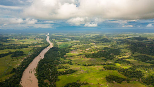 Rice fields and agricultural land in a valley among mountains. sri lanka.