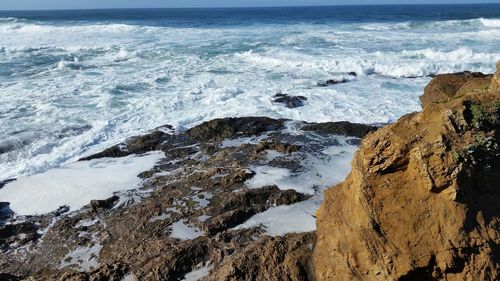 Waves breaking on rocky shore