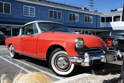 A classic vintage collector's car in a parking lot in santa monica, california