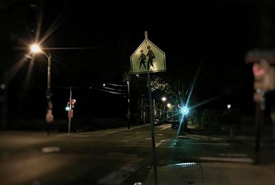 Illuminated road at night