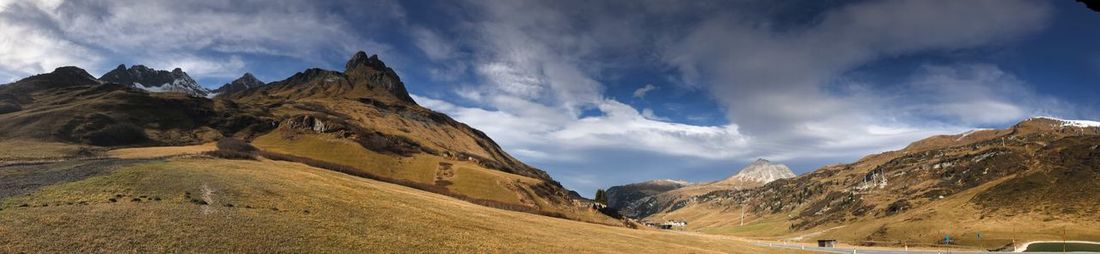 Panoramic view of landscape and mountains against sky