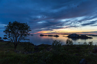 Scenic view of sea against sky at sunset