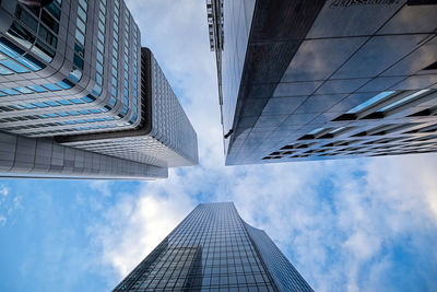 Low angle view of modern buildings against sky