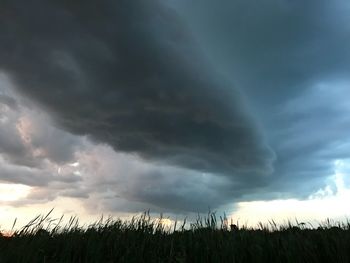 Scenic view of dramatic sky over land