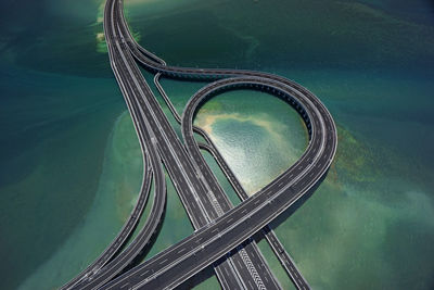 Aerial view of highway over sea