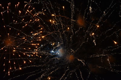 Firework display at night