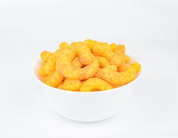 High angle view of bread in bowl against white background