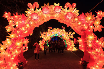 People in illuminated lanterns