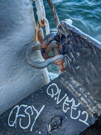 High angle view of text on rope