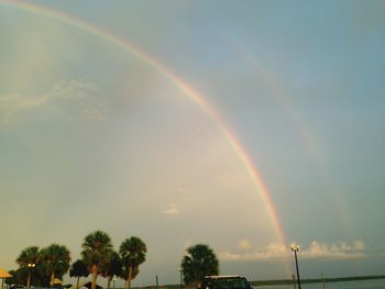 Low angle view of rainbow against sky