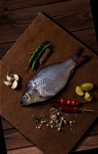 High angle view of chopped fish on cutting board