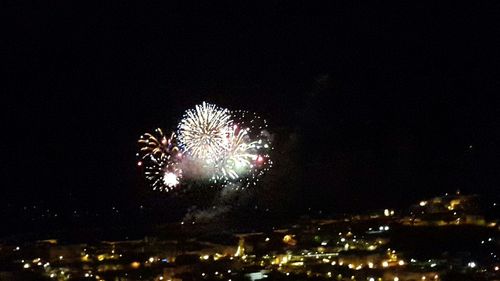 Firework display at night