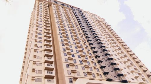 Low angle view of modern building against sky