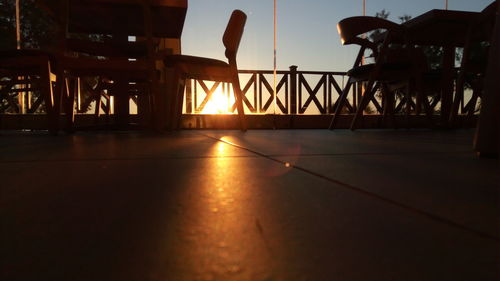 Chairs and tables against sky