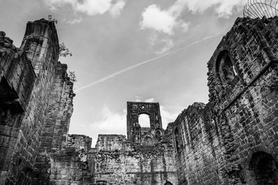 Low angle view of kirkstall abbey against sky