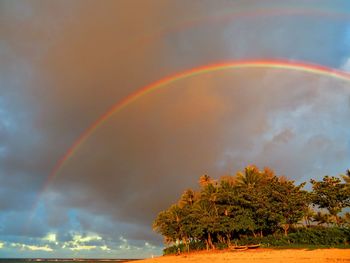 Low angle view of rainbow against sky