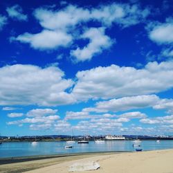 View of calm sea against cloudy sky