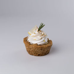 Close-up of cake against white background