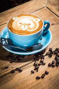 High angle view of coffee cup on table