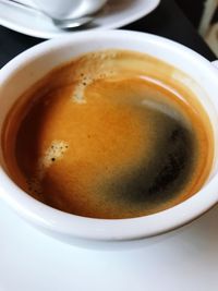 Close-up of tea cup on table