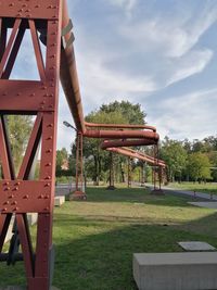 View of playground in park against sky