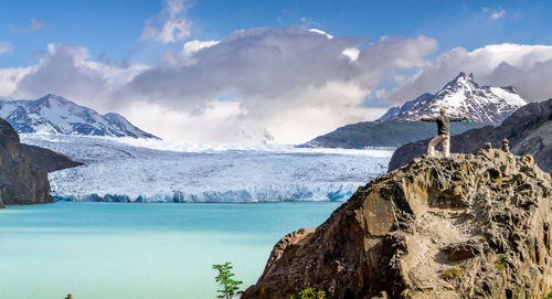 Panoramic view of snowcapped mountains against sky