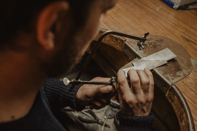 Man working on wood