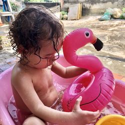 Cute girl playing with toy