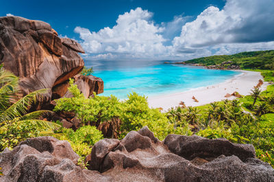 Rock formation against sea and sky