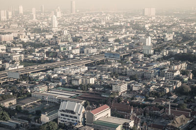 Aerial view of cityscape against sky