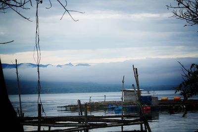 Scenic view of sea against cloudy sky