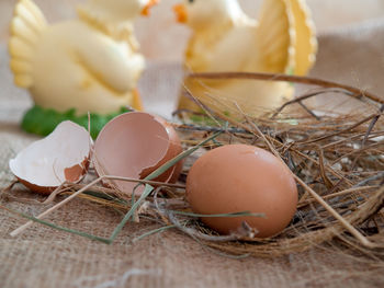 Close-up of eggs in container on table