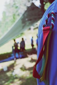 Close-up of clothes hanging against blurred background