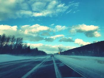 Road against sky during winter