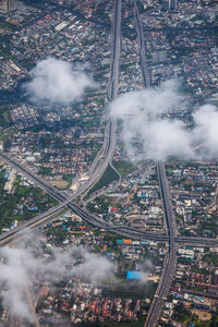 High angle view of illuminated city buildings