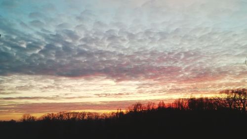 Scenic view of dramatic sky during sunset