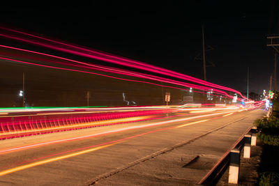 Light trails on road at night