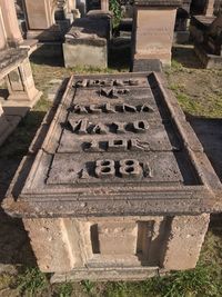 High angle view of text on cemetery