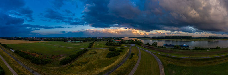 Panoramic shot of road against sky during sunset