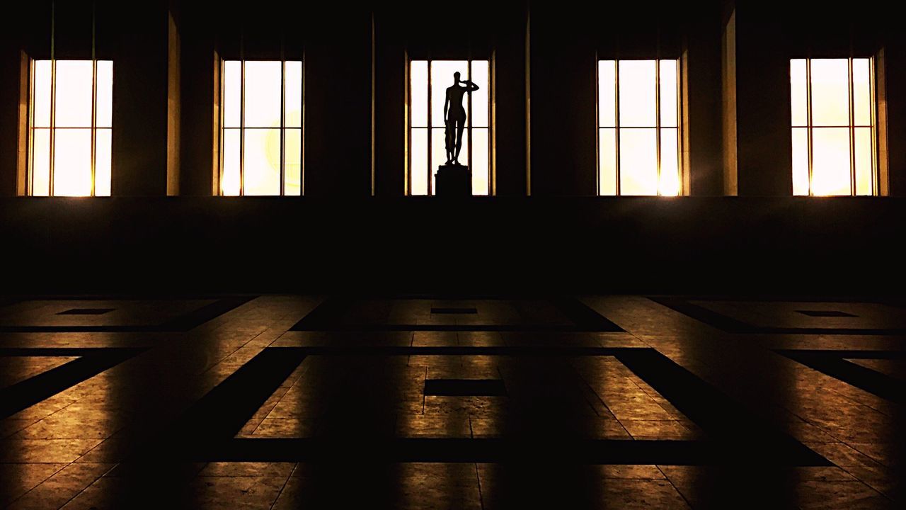 indoors, window, architecture, built structure, glass - material, reflection, building exterior, door, no people, sunlight, building, transparent, day, closed, shadow, empty, house, absence, in a row, flooring