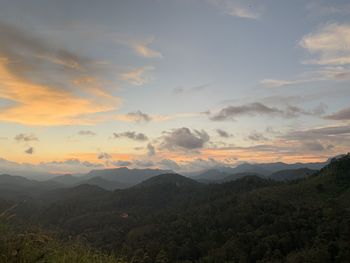 Scenic view of mountains against sky during sunset