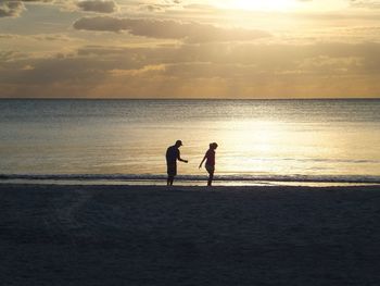 Scenic view of sea at sunset