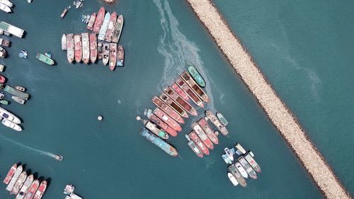 High angle view of ship in sea, harbour in hong kong 
