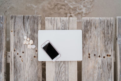 High angle view of mobile phone on table