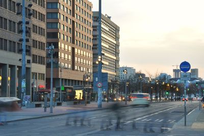 View of city street at dusk